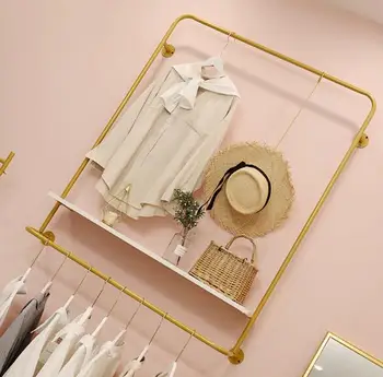 Drabužių parduotuvė sienos pakaba display rack Šiaurės šalių moteriškų drabužių parduotuvė sienos kabinti drabužius display rack aukso paprasta.