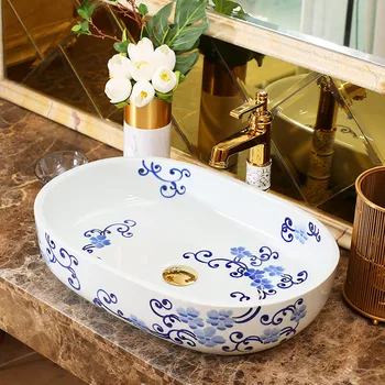 Ovalo formos mėlynos ir baltos spalvos Vonios kambario keramikos skaitiklis viršuje kriauklė kriauklės populiarus europoje meno baseino lavabo vertus kriaukle